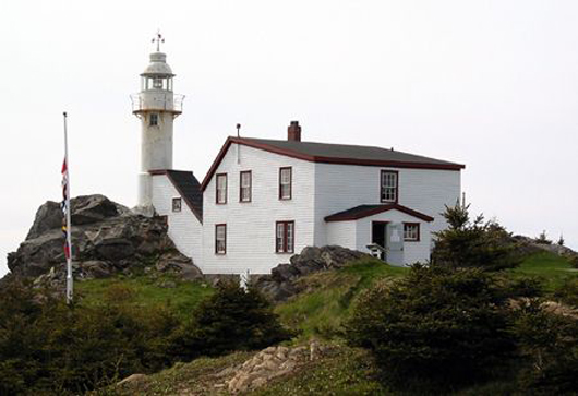 Lighthouse at Lobster Cove Head, Newfoundland and Labrador.